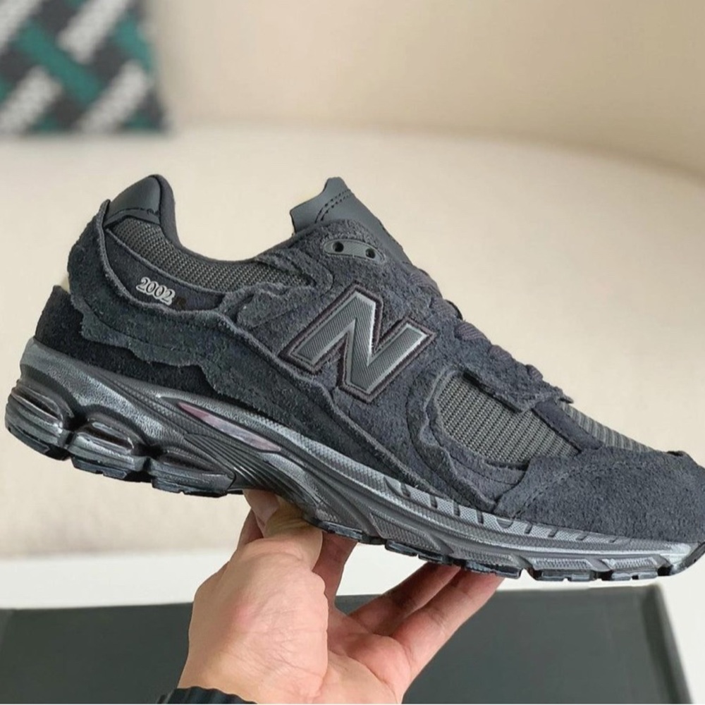 new balance 2002r grey sneakers 
size 11